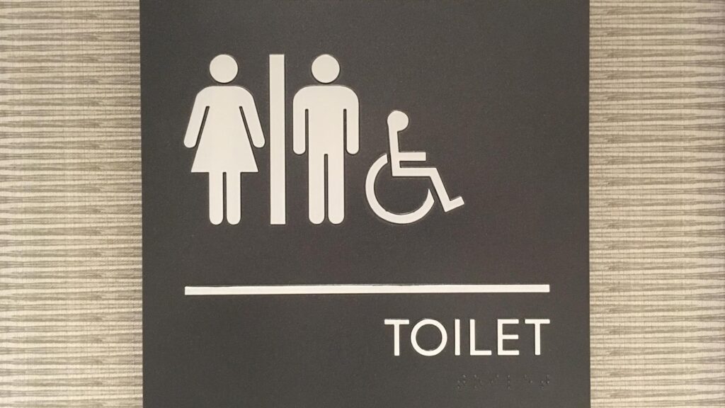 Photo of ADA restroom sign