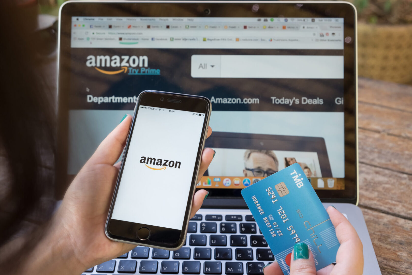 Photo of person ordering products on Amazon